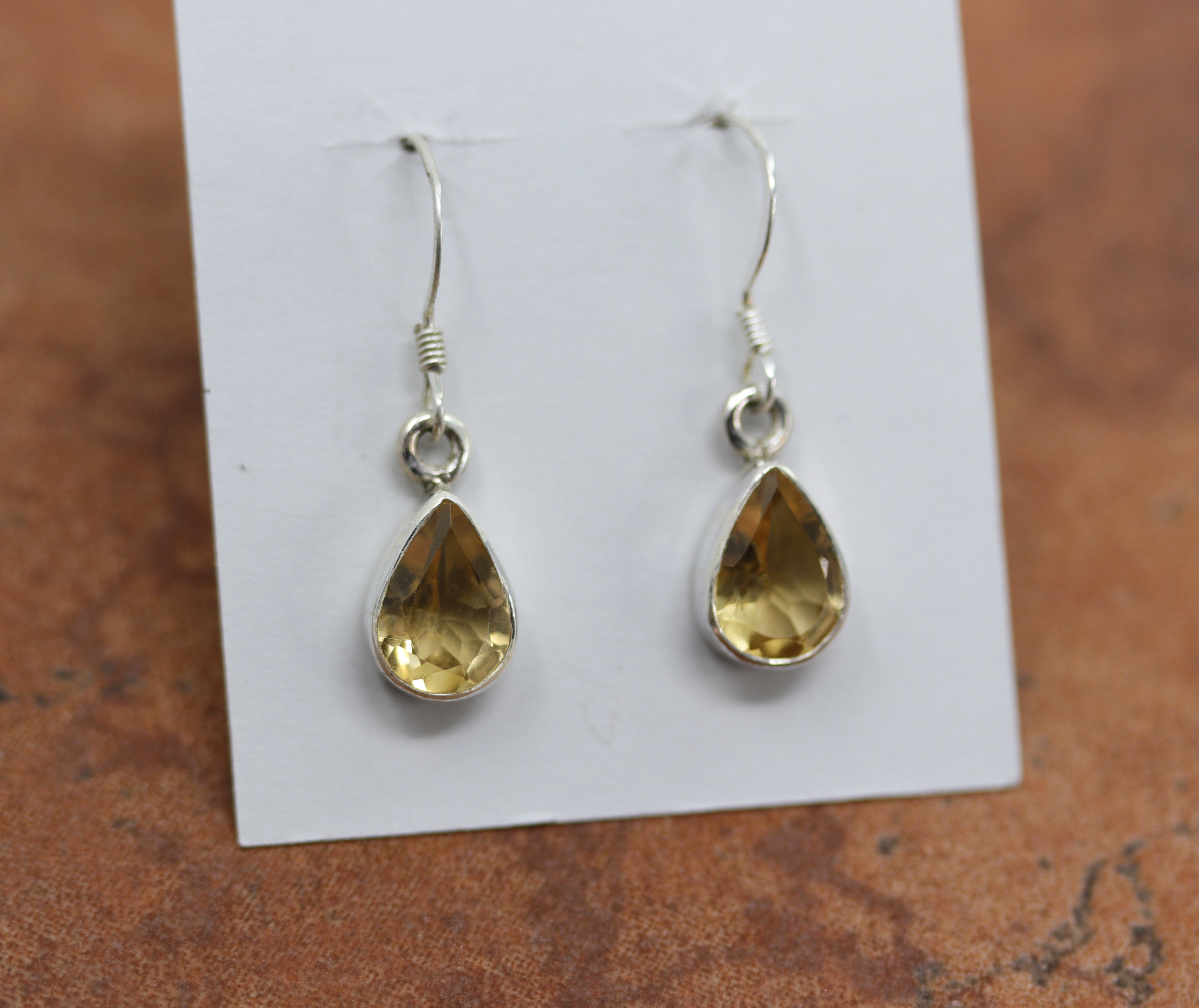 Silver Hook Earrings with teardrop shaped yellow citrine stones