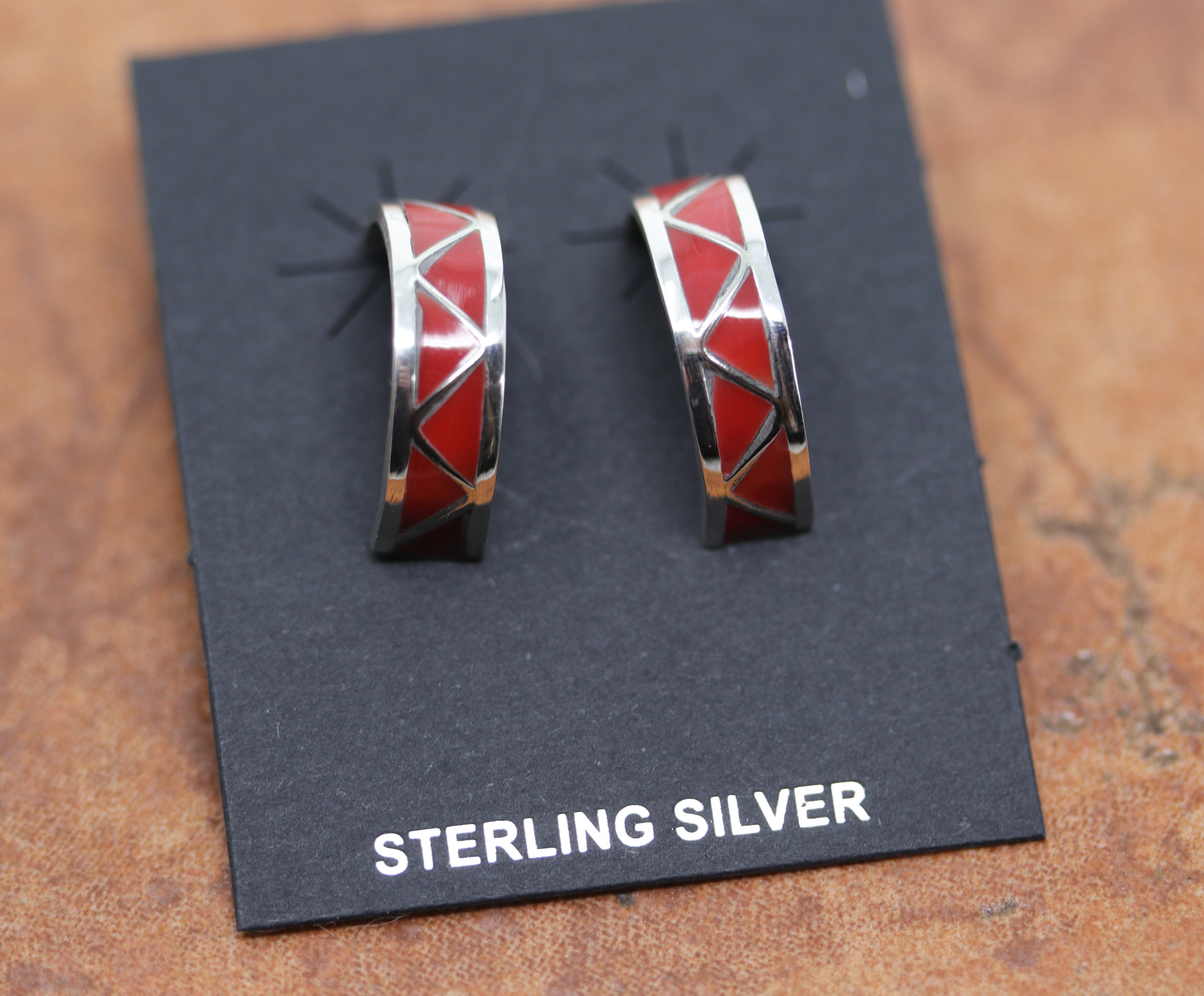 Circular red hoop earrings