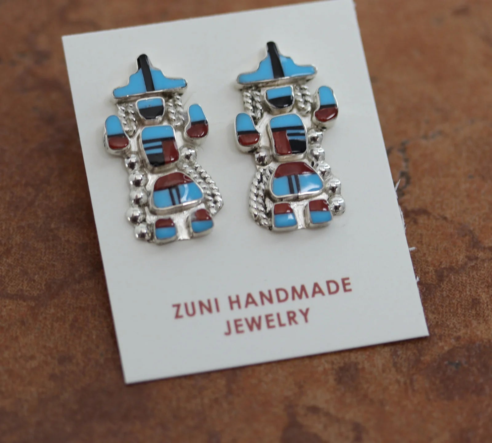 Kachina shaped earrings made from Turquoise, Onyx, and Coral stones