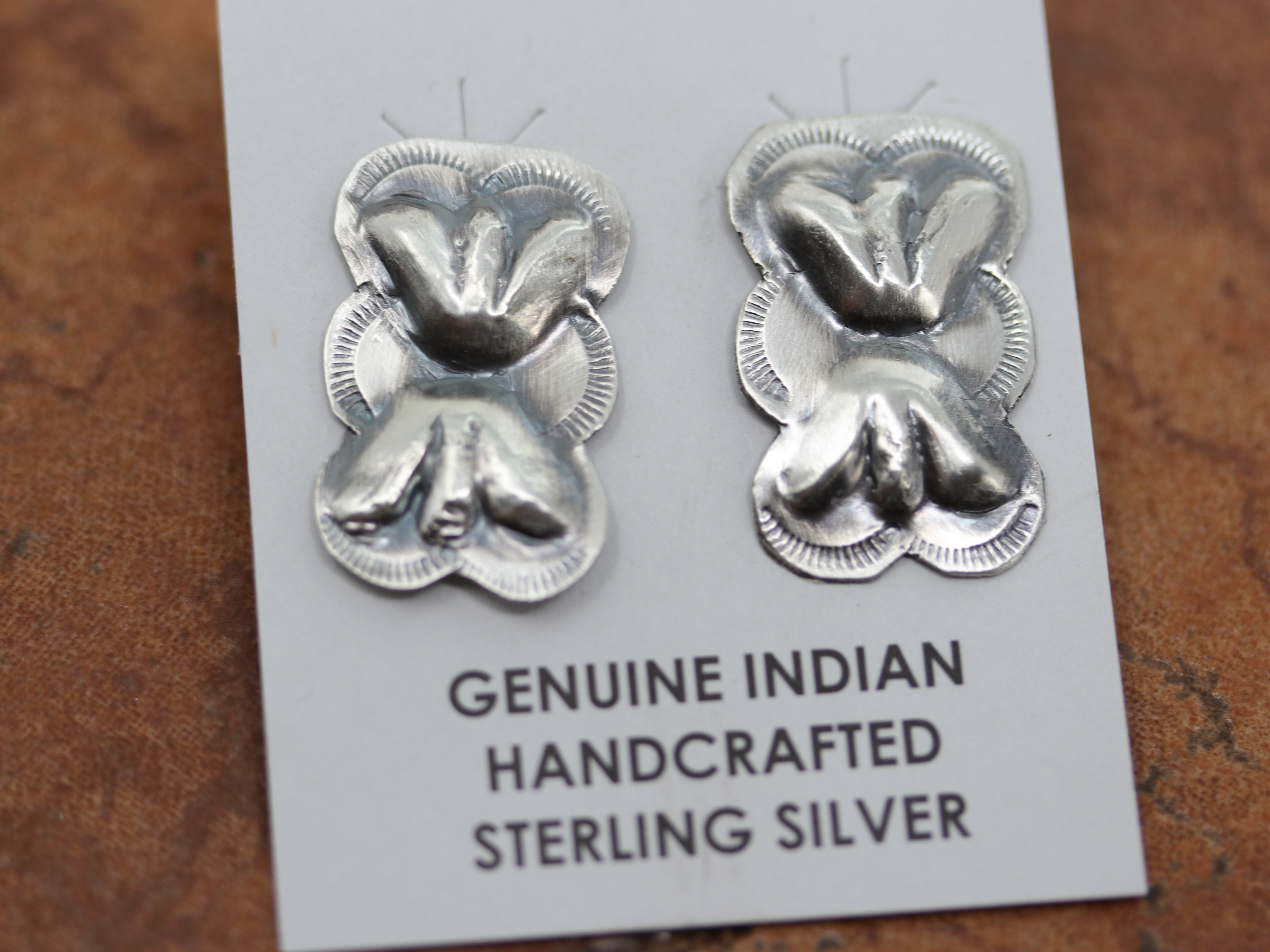 Silver butterfly shaped earrings